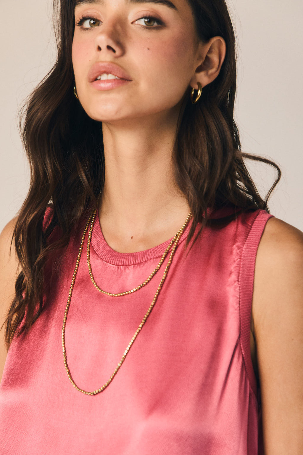 Top sin mangas ribete color fresa