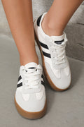 Olina | Zapatillas planas con rayas negras