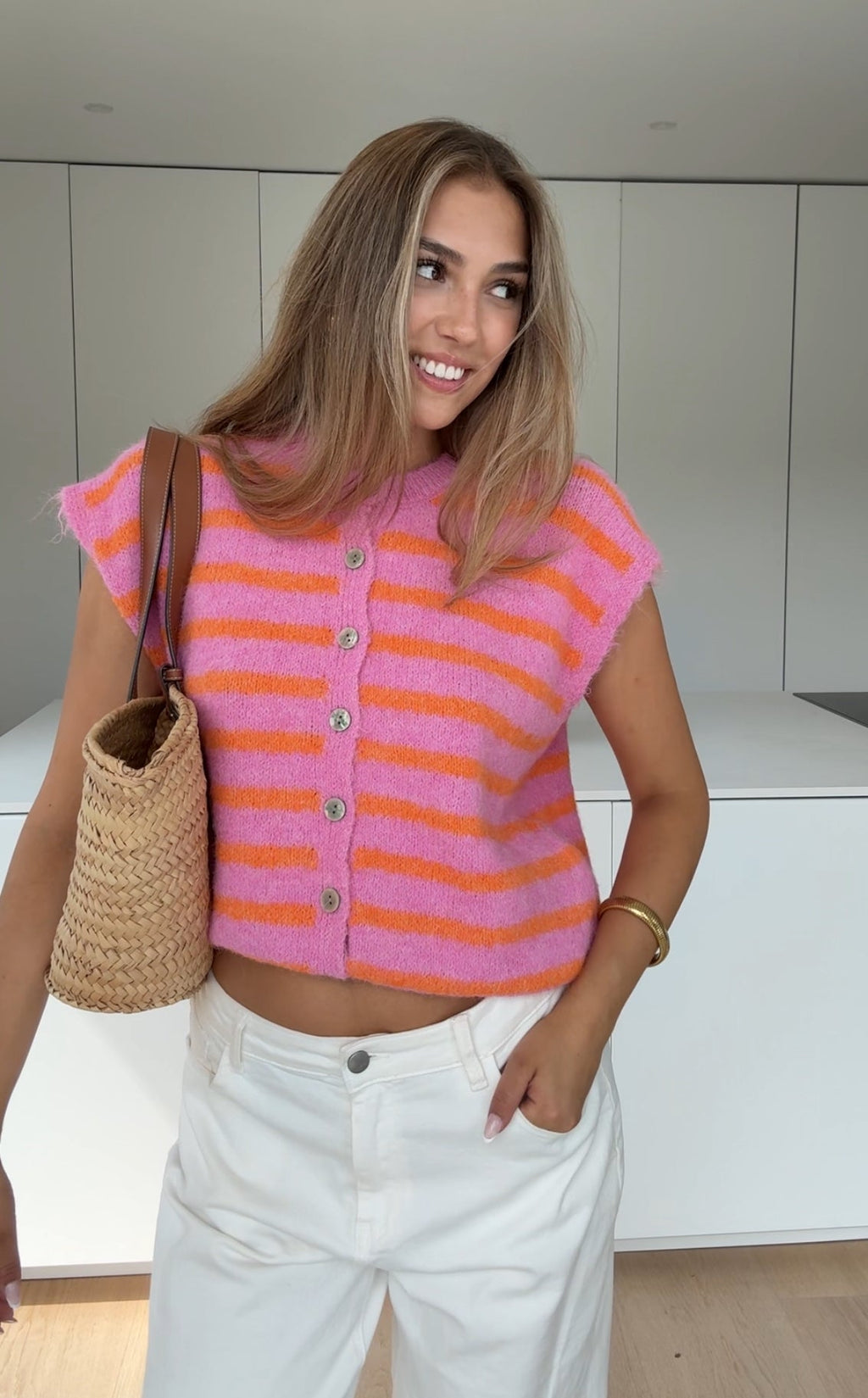 SUDADERA SIN MANGAS A RAYAS COLOR CEREZA
