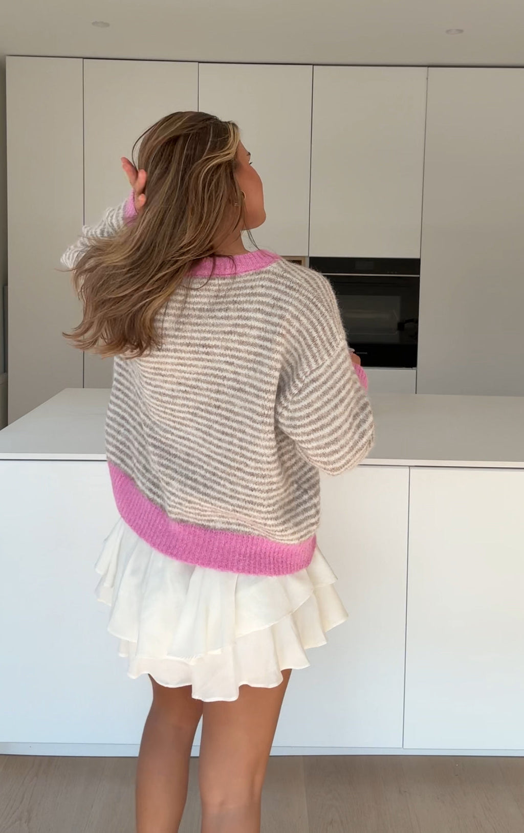 CARDIGÁN SUAVE A RAYAS ROSA CREMOSA
