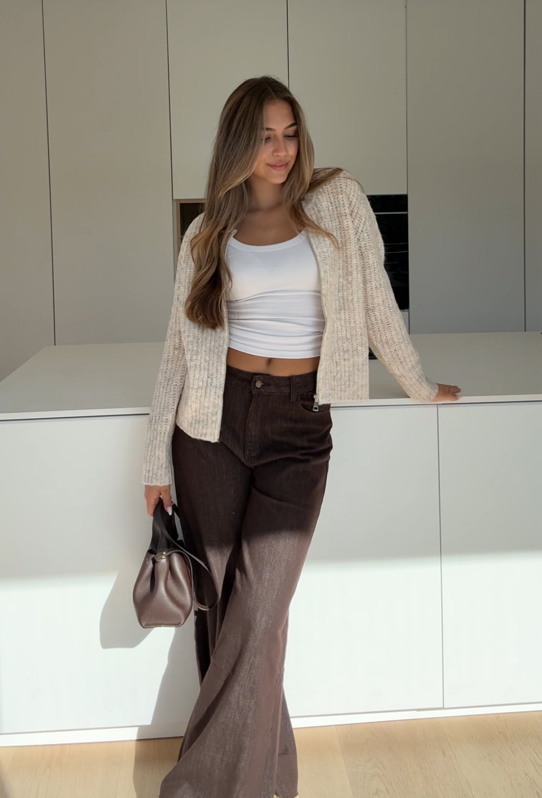 CARDIGÁN DE PUNTO ZIP CREMA