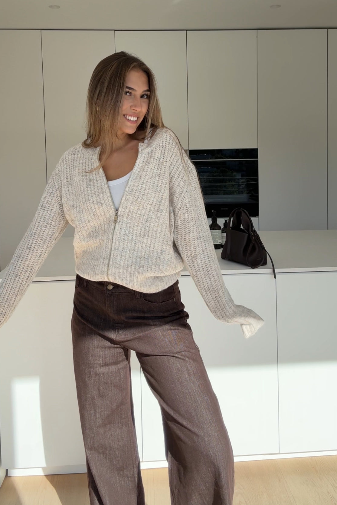 CARDIGÁN DE PUNTO ZIP CREMA