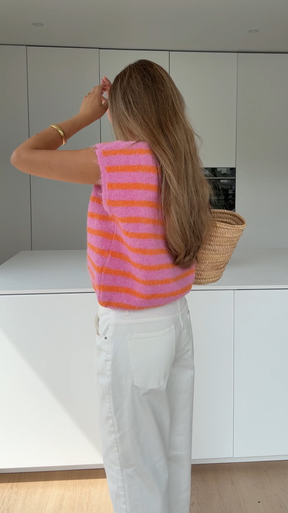 SUDADERA SIN MANGAS A RAYAS COLOR CEREZA