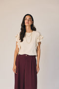 Camiseta volante tachas crudo
