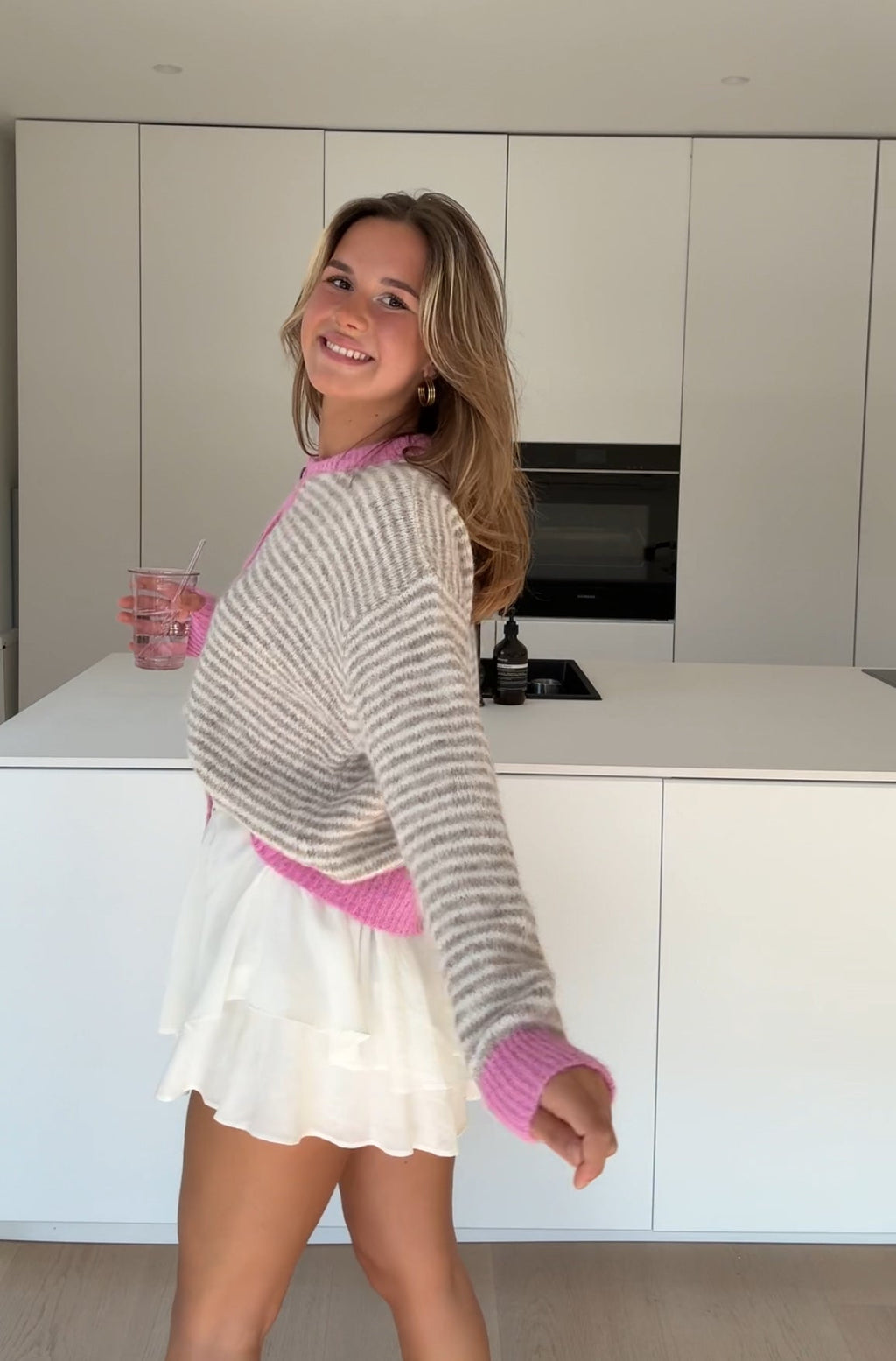 CARDIGÁN SUAVE A RAYAS ROSA CREMOSA