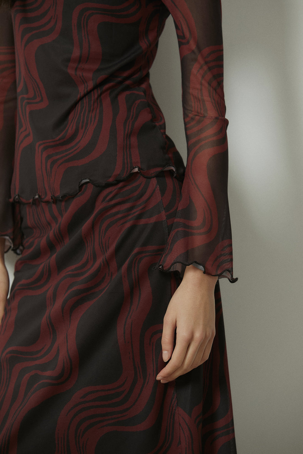 Top de tul estampado ondas teja