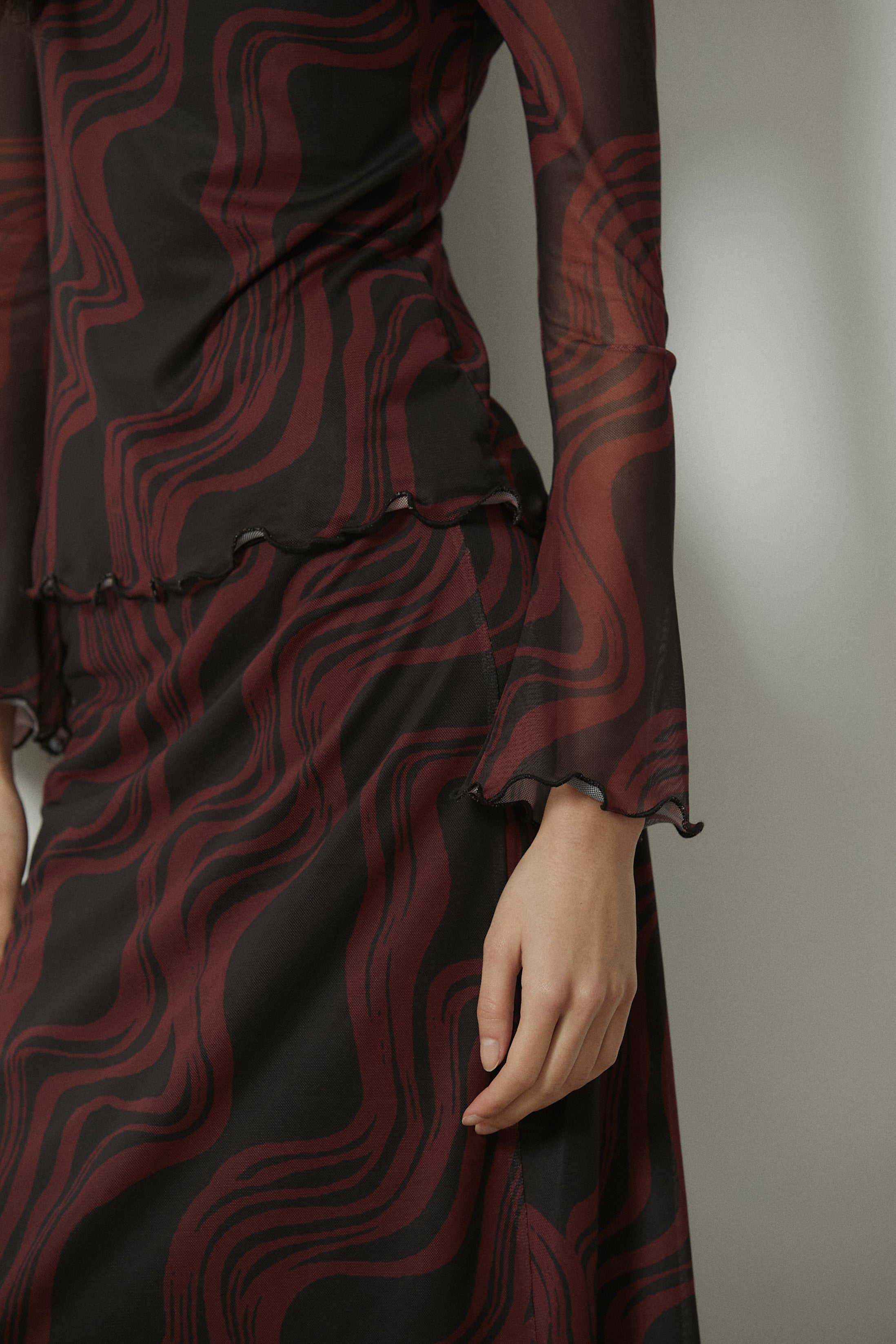 Top de tul estampado ondas teja