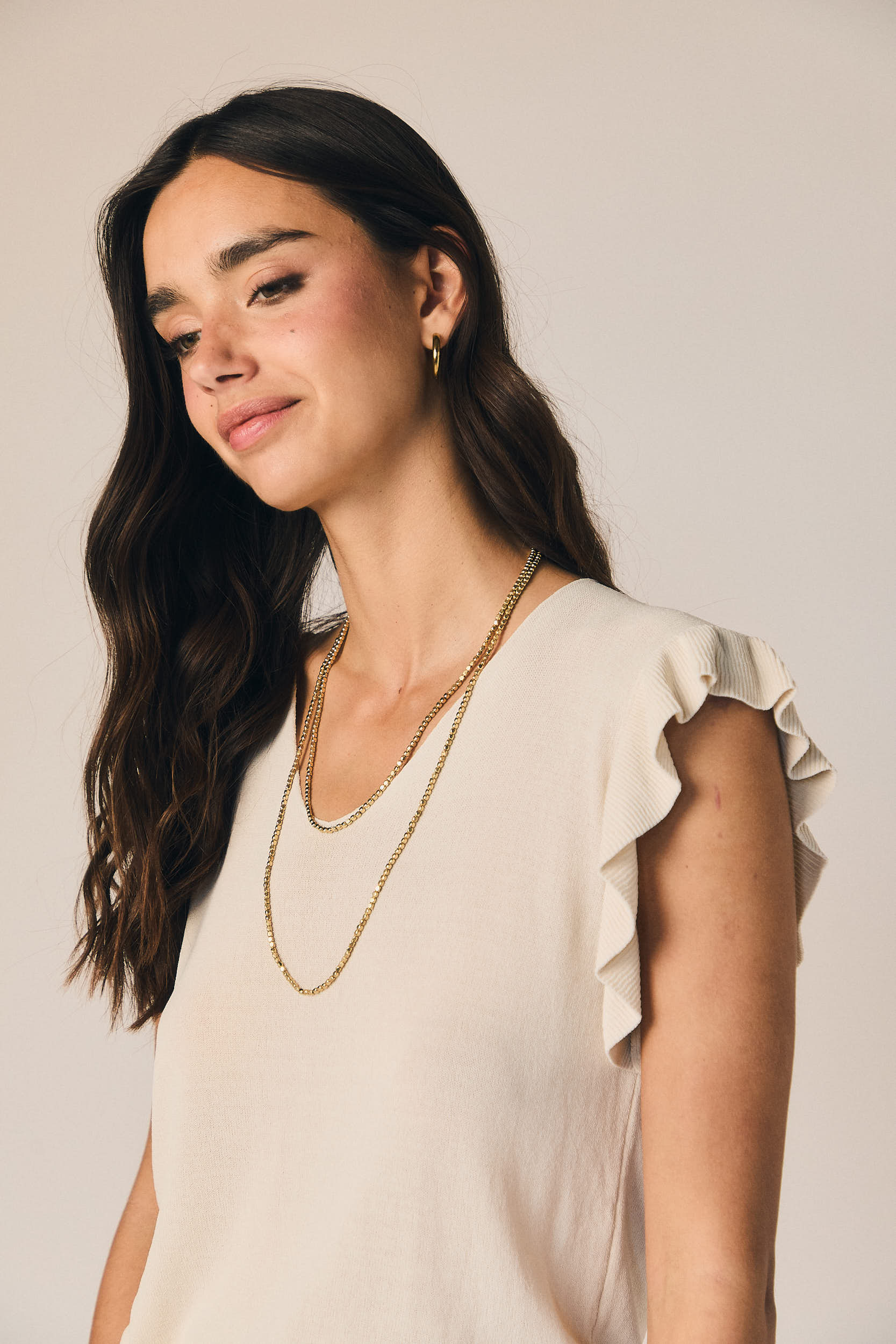 Top punto manga volante beige