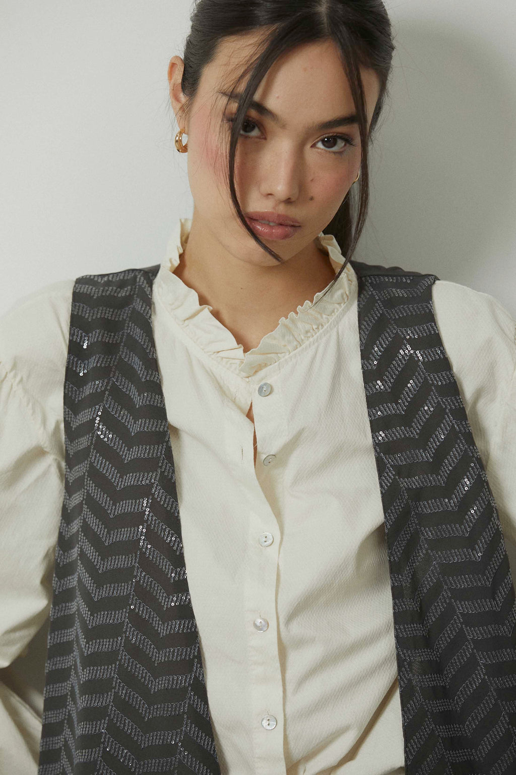 Chaleco zig zag lentejuelas gris