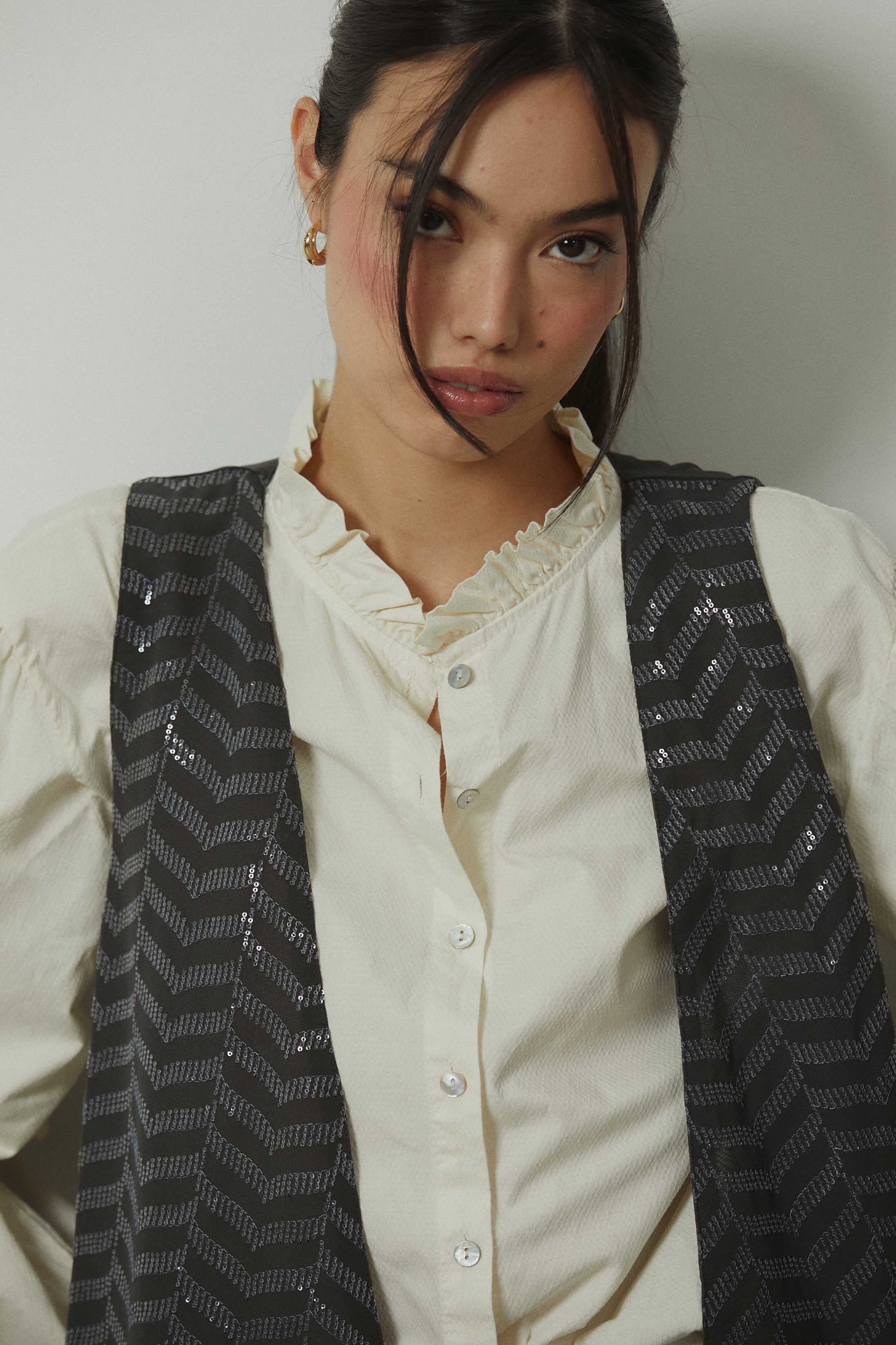 Chaleco zig zag lentejuelas gris