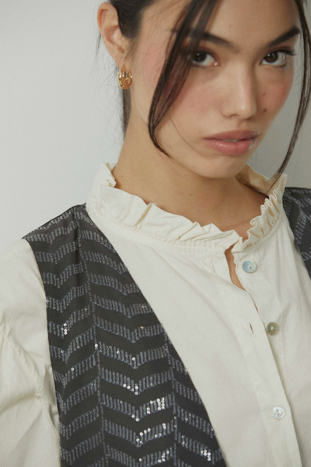 Chaleco zig zag lentejuelas gris