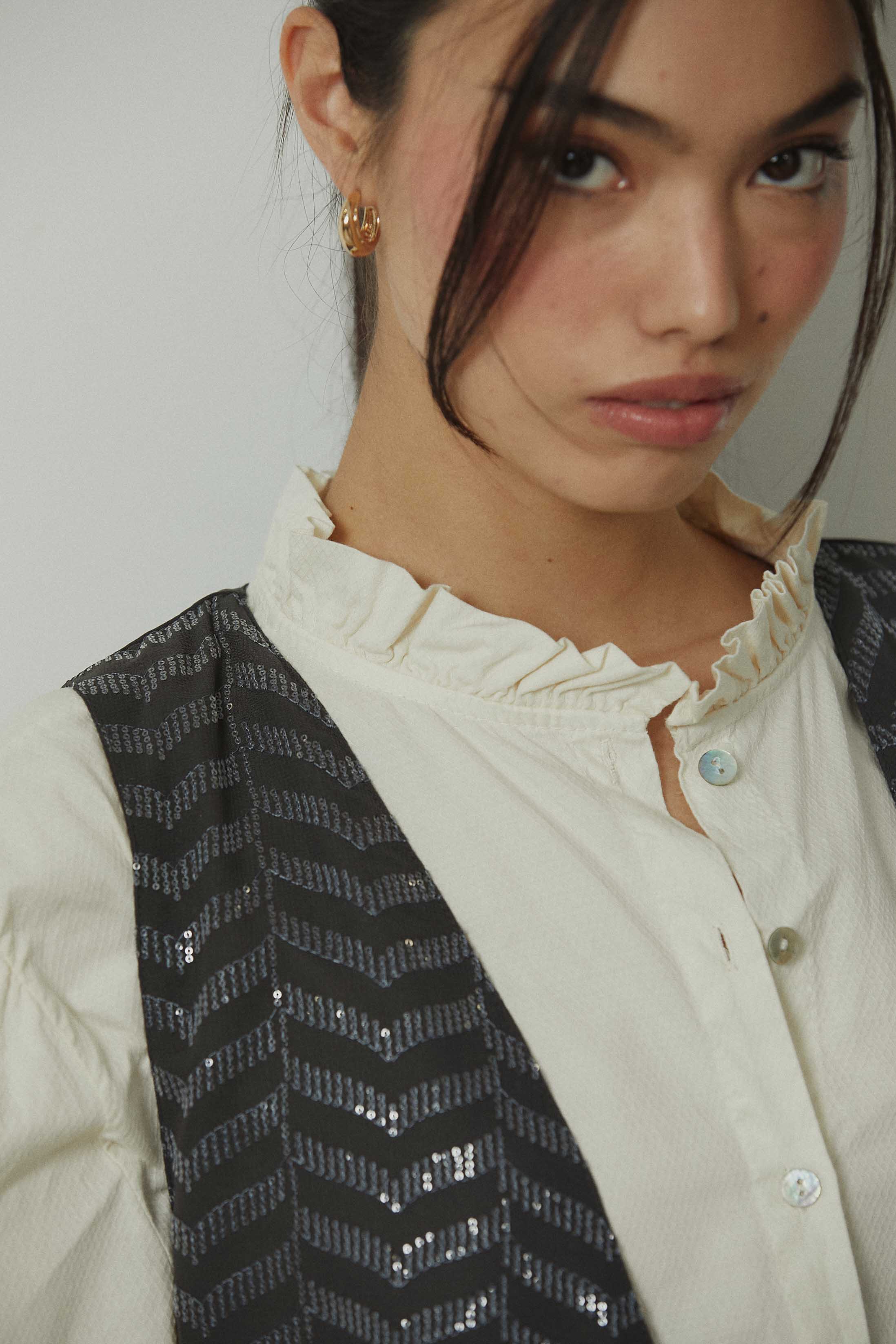 Chaleco zig zag lentejuelas gris